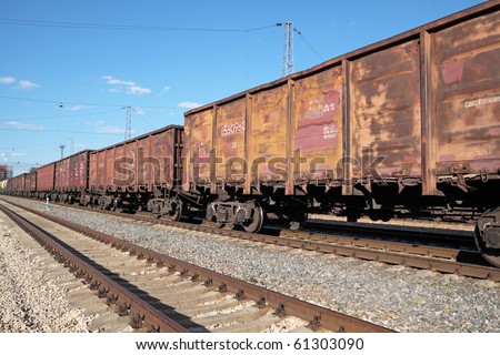 The locomotive drags freight cars