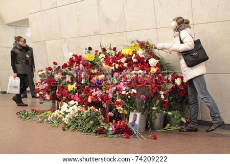 MOSCOW, RUSSIA - MAR 29: Natural flowers in the Moscow underground at station Lubyanka in an anniversary of memory of victims at acts of terrorism on Mar 29, 2011 in Moscow.