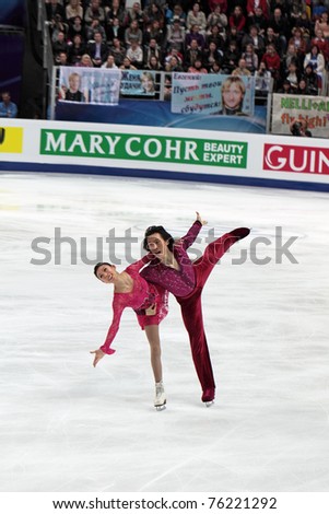 MOSCOW, RUSSIA - APR 28: World championship on figure skating 2011. Pang Qing and Tong Jian - the bronze medallists in pair figure skating. Palace of sports \