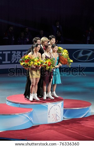 MOSCOW, RUSSIA - APR 30: World championship on figure skating 2011. Ceremony of rewarding of winners in pair figure skating. Palace of sports \