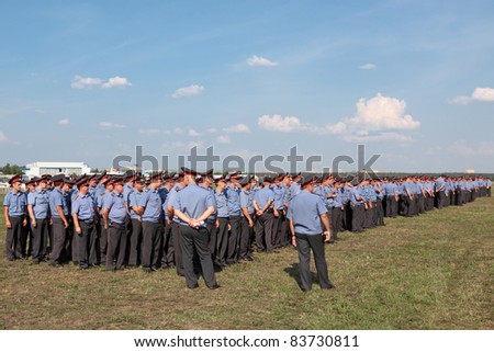 MOSCOW, RUSSIA - AUG 15: Squads of police lined up for briefing on safety measures at the International Aviation and Space salon MAKS on Aug, 15, 2011 at Zhukovsky, Russia