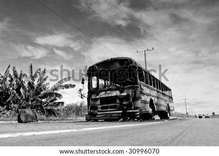 APOPA, EL SALVADOR. A city bus burned by gang members in Apopa, El Salvador.