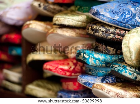 colorful silk slippers as background