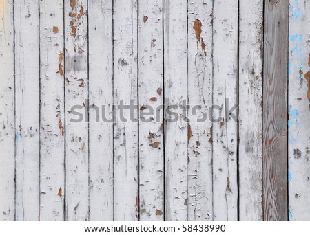 Old painted wooden fence close-up, may be used as background