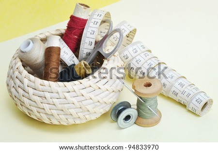 Still-life various accessories of sewing in a basket
