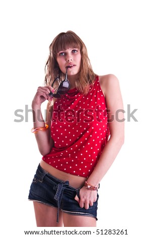 woman in red spotted blouse with sun glasses