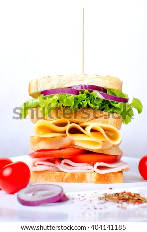 Big appetizing sandwich. Meat sandwich.Great sandwich.Sandwich on a white background.