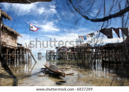 a view of a fishing village through the fishing net