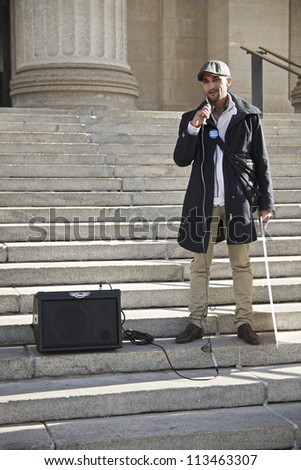 WINNIPEG, CANADA - SEPTEMBER 17: Student Mohamed Ahdelkarim Ammoamon addresses a group marking the first anniversary of the Occupy Wall Street protests on September 17, 2012 in Winnipeg.