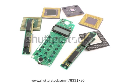 Circuit board (keypad) for cell phone with processors and RAM over white.