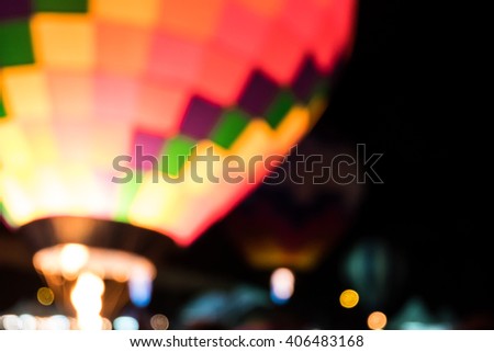 Blur hot air multicolor balloon on night time