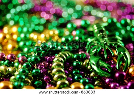 Mardis Gras beads with plastic crawfish