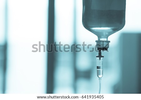Selective focus  Infusion bottle with IV solution in the patient room