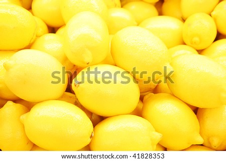 group of lemon on yellow background