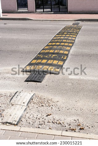 speed bump on a road in Spain to slow down traffic