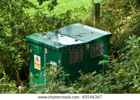 High voltage transformer box in country environment