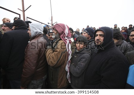 Syrian refugees who came from Aleppo waiting at the refugee camp in Essalame border gate on Turkey - Syria border in Essalame, Syria, 02 February 2016