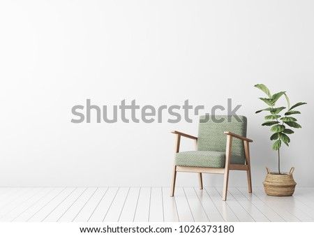 Interior mock up with green fabric armchair and fiddle leaf tree in wicker basket in living room with white wall. 3D rendering.