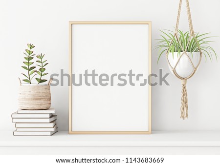 Home interior poster mock up with vertical metal frame, succulents in basket, pile of books and macrame plant hanger on white wall background. 3D rendering.