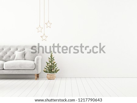 Living room interior wall mock up with grey tufted sofa, fur pillow, stars and decorated christmas tree on empty white background. 3D rendering.