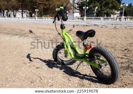 Balance bike without pedals on the beach