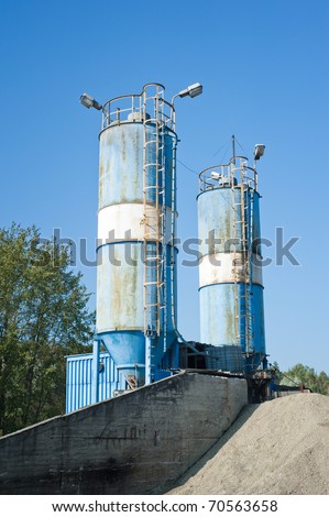Blue cement silos in the cement factory