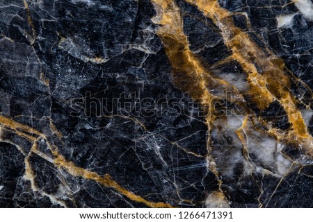 Gold and white Patterned natural of dark gray marble (Gold Russia) texture background for product design.