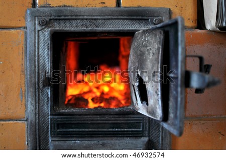 tiled stove with fire
