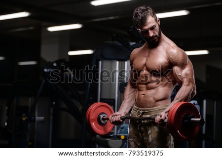 sexy strong bodybuilder athletic fitness man pumping up abs muscles workout bodybuilding concept background - muscular bodybuilder handsome men doing fitness health care exercises in gym naked torso