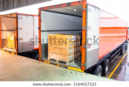 Freight truck, pallet shipment, Warehouse logistic transportation by truck loading the shipment into truck.