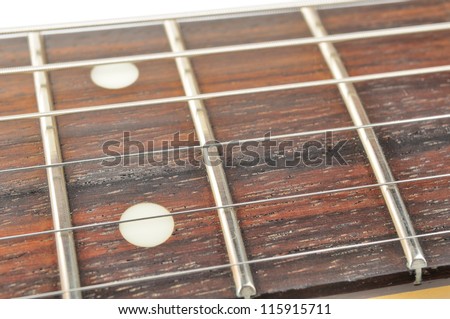 Electric Guitar Fingerboard (Fretboard) with Strings Close-up