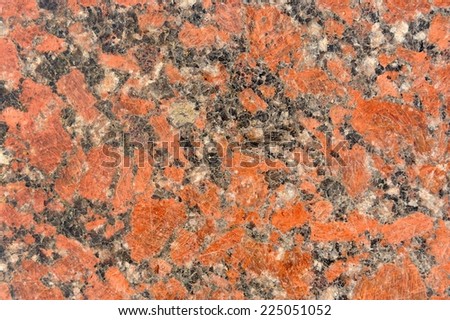 Mottled Black and Red Granite Texture