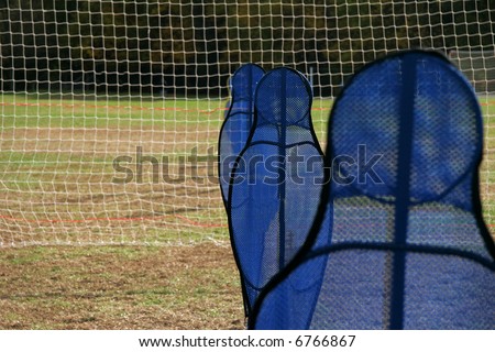 these blue shapes are used to help players control the ball around opposing defensemen.  They are practice 