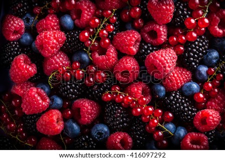Berries assorted mix in studio dark background