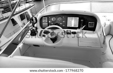 yacht marine equipment  Instrument panel and steering wheel of a motor boat cockpit