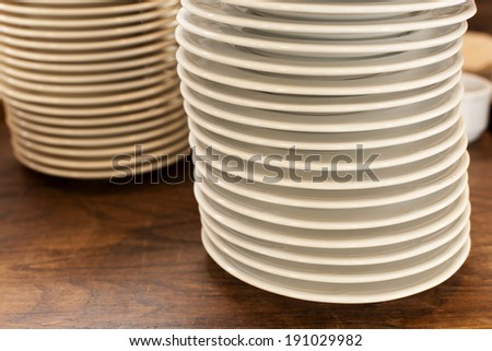 utensils in the kitchen and in the restaurant  empty bowls, plates, cups and glasses