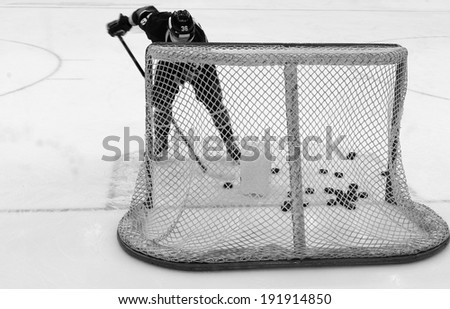 hockey goals, coaching the goalkeeper, black and white photo