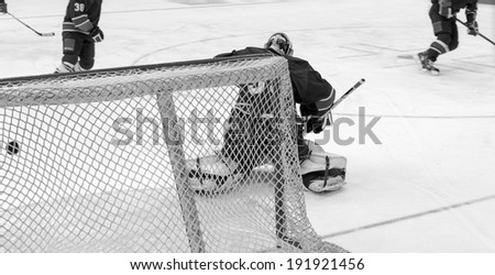 hockey goals, coaching the goalkeeper, black and white photo