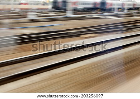 train fast run on railway track Modern train at the station