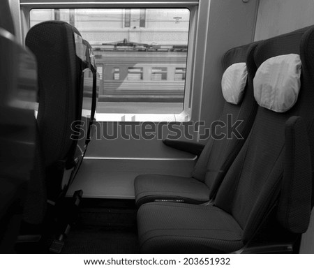 Empty interior of a passenger train car .  Public transport.  Modern train at the station