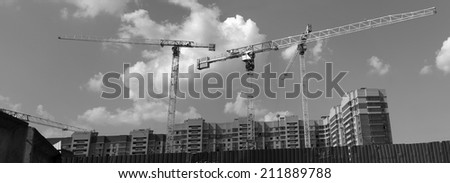 Crane and building construction construction site black and white photography