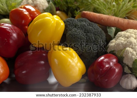 various foods in the kitchen Different ripe foods lying on a  table as a background