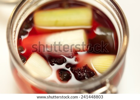 Marinated mixed fruits, vegetables and mushrooms of home canning