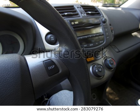 close-up of car  button. Modern car interior with dashboard and cockpit details