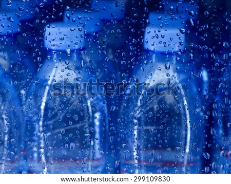 cold bottle of natural water. Mineral water in the refrigerator