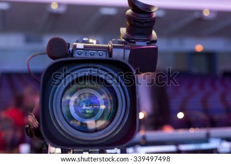 Professional digital video camera. tv camera in a concert hal. \
Digital TV camera