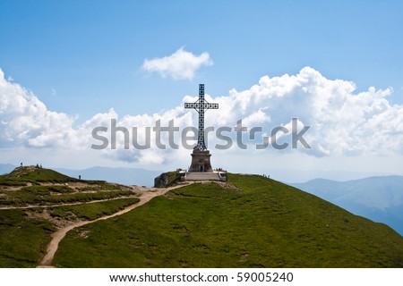 Back view of Caraiman heroes cross monument in Bucegi mountains Romania