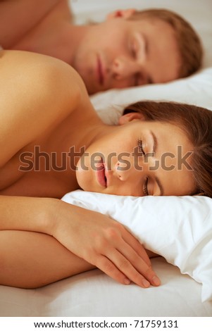 Happy sleeping couple