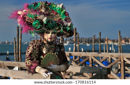 VENICE-FEBRUARY 25 : Posing mask in St.Mark\'s Square on February 25 , 2011 in Venice , Italy