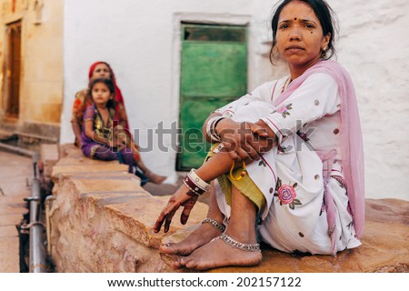JAISALMER - MARCH 22 : women posing in the street on March 22 , 2014 in Jaisalmer,India
